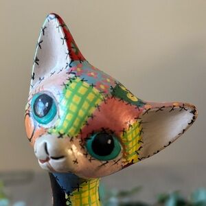 Mid-century multicolor cat, signed by Morris.